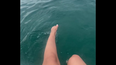 The warm sea water caresses my feet